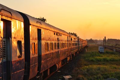 Train against sky during sunset