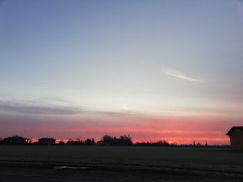 Scenic view of silhouette landscape against sky during sunset