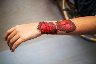 Close up of zombie hand with blood. horror and scary concept. thriller concept.