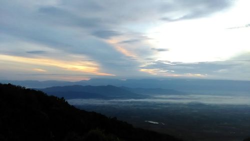 Scenic view of mountains against sky during sunset