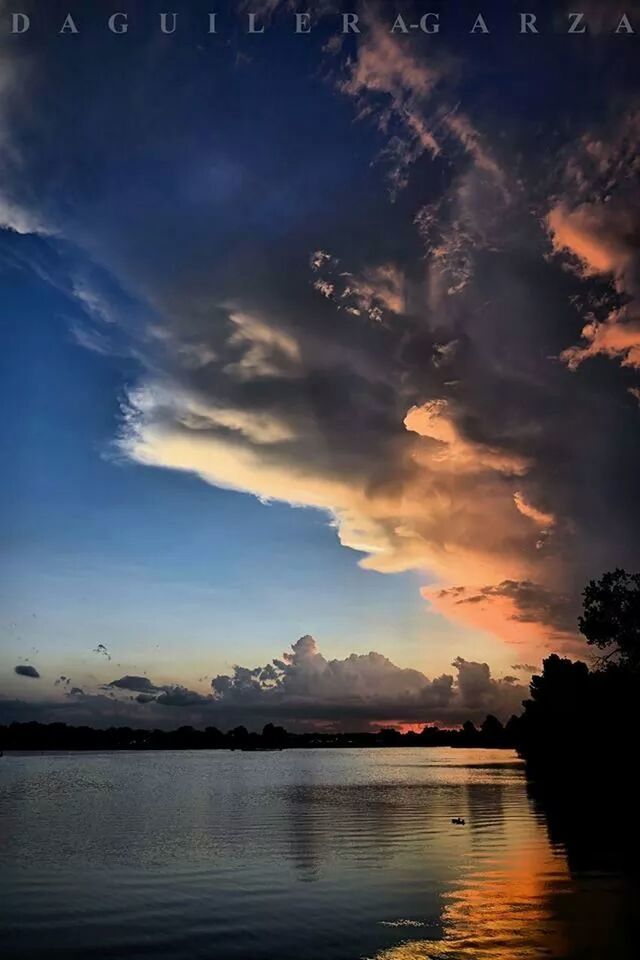 water, sky, scenics, tranquil scene, sunset, beauty in nature, tranquility, cloud - sky, waterfront, sea, silhouette, nature, reflection, idyllic, mountain, lake, cloud, dusk, cloudy, outdoors