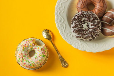 Directly above shot of donut on red background