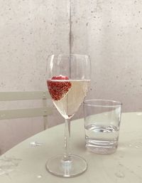 Close-up of wine in glass on table