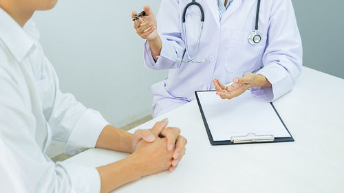 Low angle view of people on table