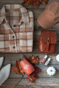 High angle view of personal accessories on table