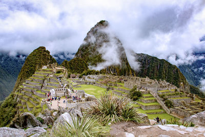 High angle view of machu picchu against cloudy sky