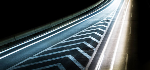 High angle view of light trails of moving vehicle on road