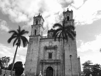 Low angle view of bell tower against sky