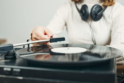 Playing music. retro music party. vintage style. analog. listening to music from vinyl record. play