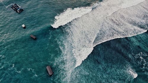 High angle view of people on boat in sea