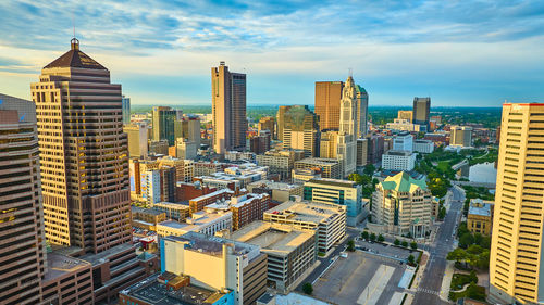 Buildings in city against sky