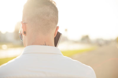 Rear view portrait of teenage boy