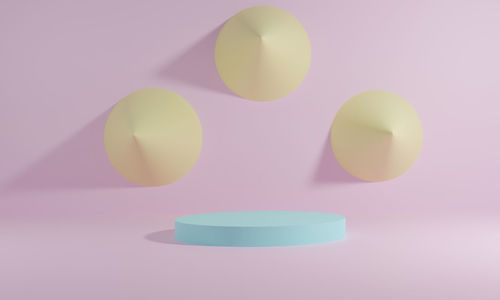 Close-up of pink balloons against white background