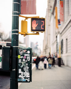 Road sign on street in city