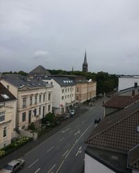 Road in city against sky