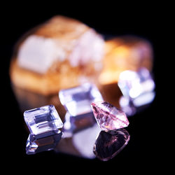 Close-up of wedding rings on table