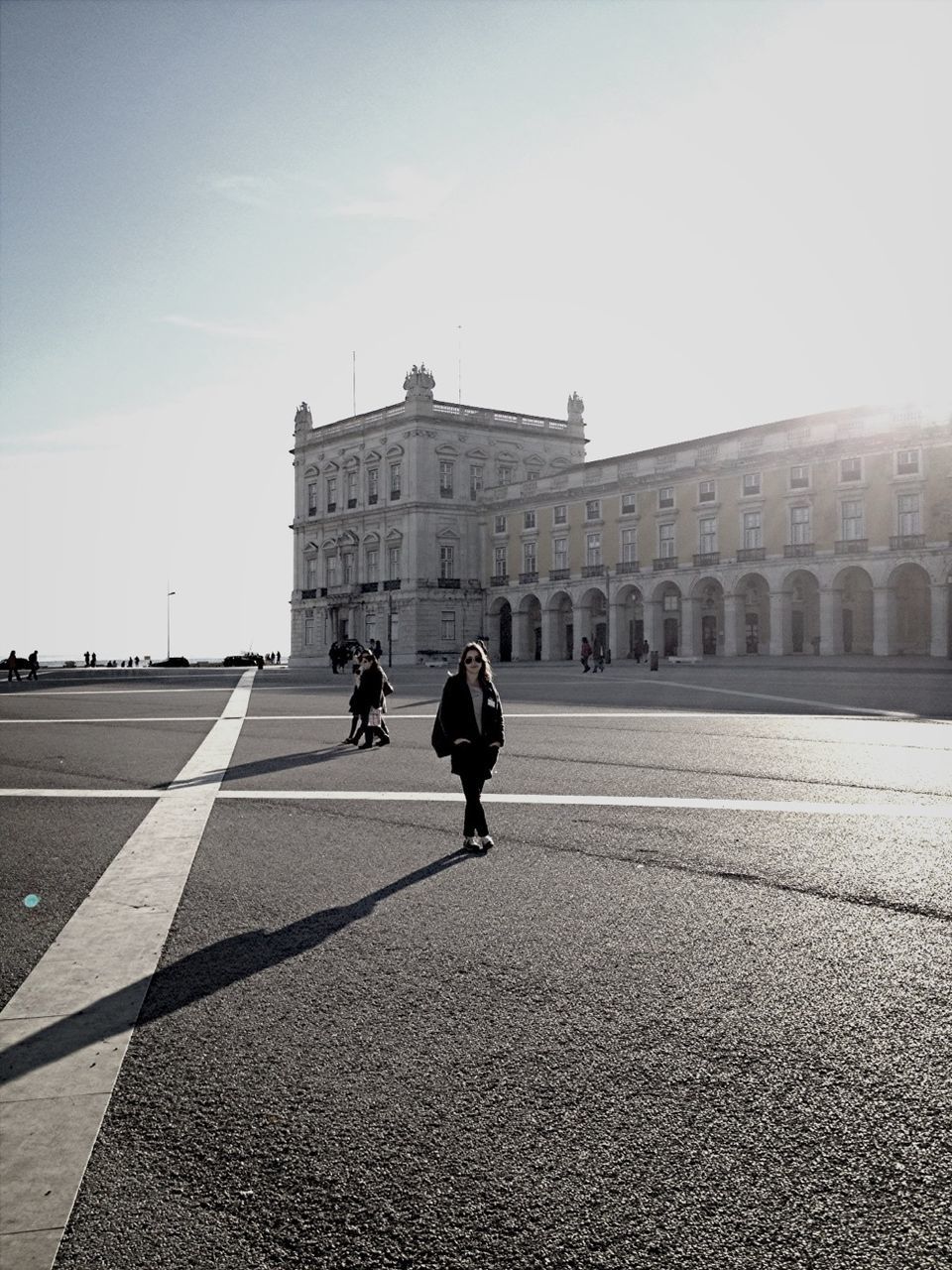 architecture, building exterior, built structure, walking, men, street, religion, city, place of worship, sky, travel destinations, famous place, church, travel, incidental people, road, person, spirituality