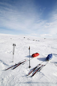 Skis and toboggan