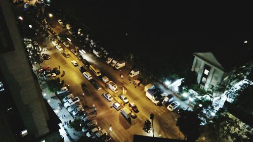 High angle view of illuminated street at night