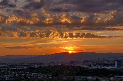 View of cityscape at sunset