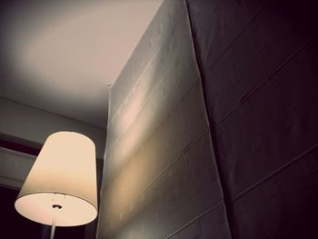 Low angle view of illuminated ceiling