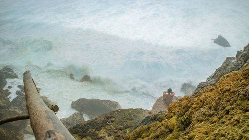 High angle view of sea and rocks