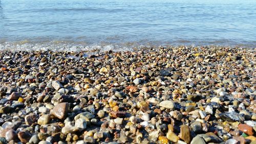 Scenic view of pebbles on beach