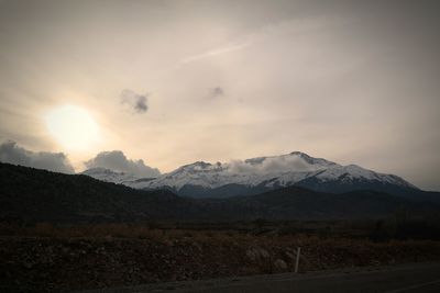 Scenic view of mountains against sky during sunset