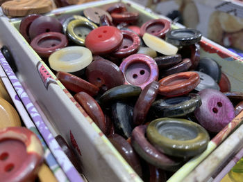 High angle view of various eggs in container