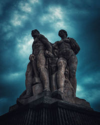 Low angle view of statue against sky