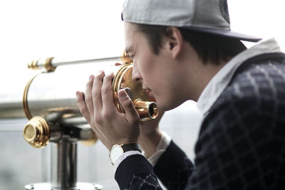 Close-up of man holding camera