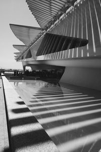 Tilt image of built structure against sky