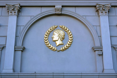 Close-up of statue against door