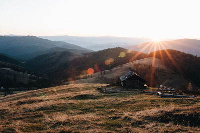 Scenic view of mountains against sky during sunset