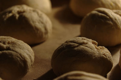 Close-up of bread rolls on baking tray