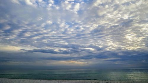 Scenic view of sea against dramatic sky