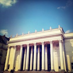 Low angle view of building against blue sky