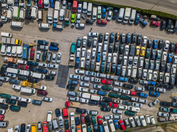 Aerial view of colorful cars parked on parking lot