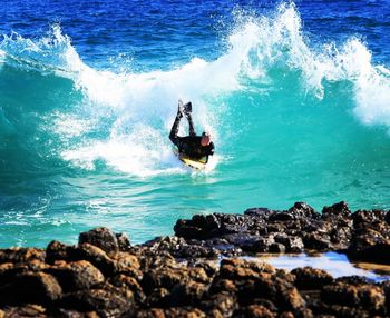 Man surfing in sea