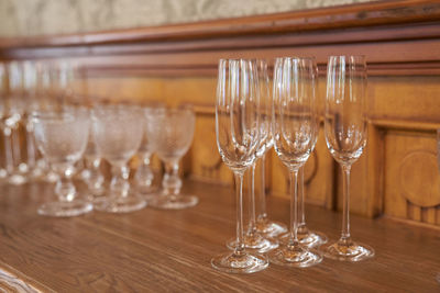 Close-up of wineglasses on table