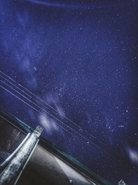 Low angle view of stars against sky at night