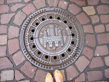 Close-up of circular object on wall