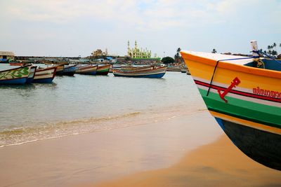 Boats moored in sea