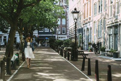 Woman walking through old city