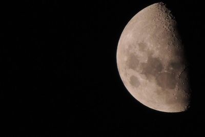 Scenic view of moon against sky at night