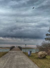 Scenic view of sea against cloudy sky