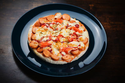 High angle view of pizza on table