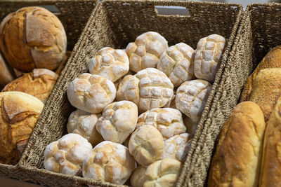 Assortment of various types of italian bread in a bakery.