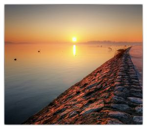 Scenic view of sea at sunset