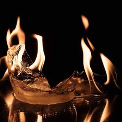 Close-up of burning candle